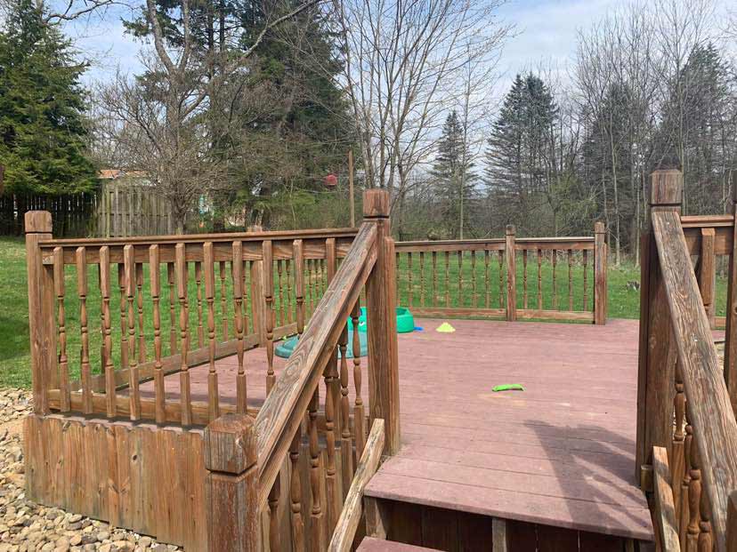 free standing deck in a yard