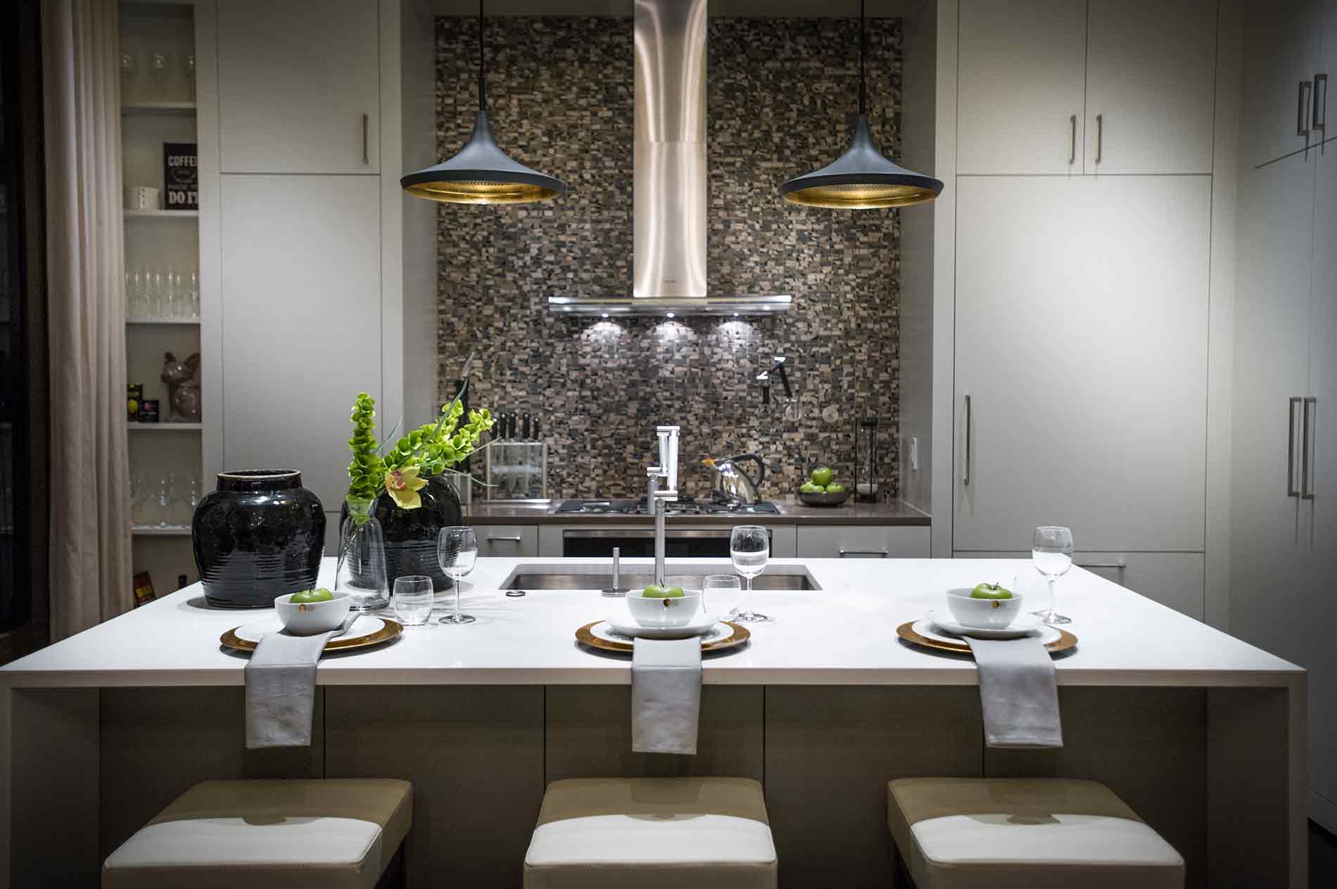 kitchen with tiled backsplash from counter to ceiling