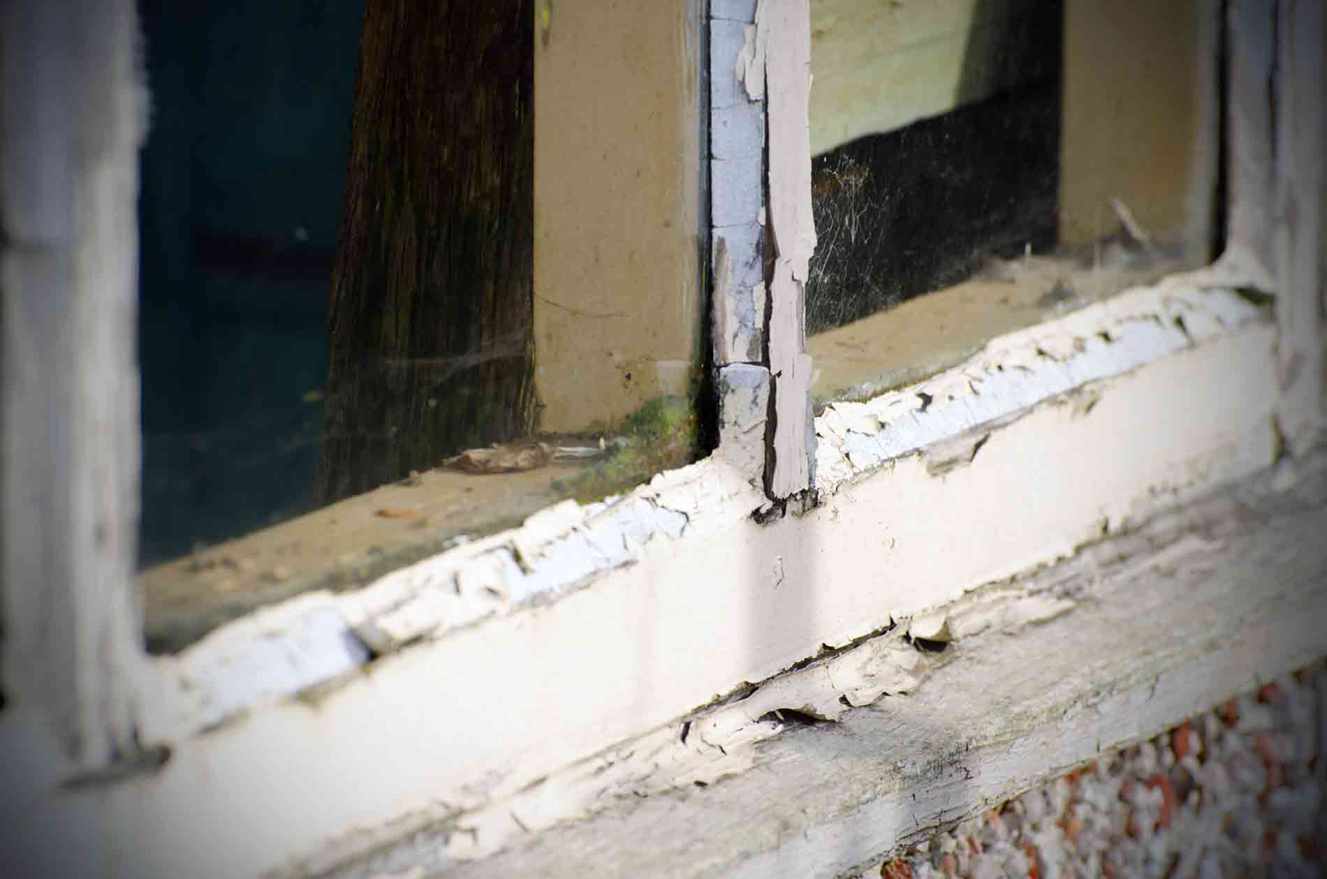 old window with peeling paint