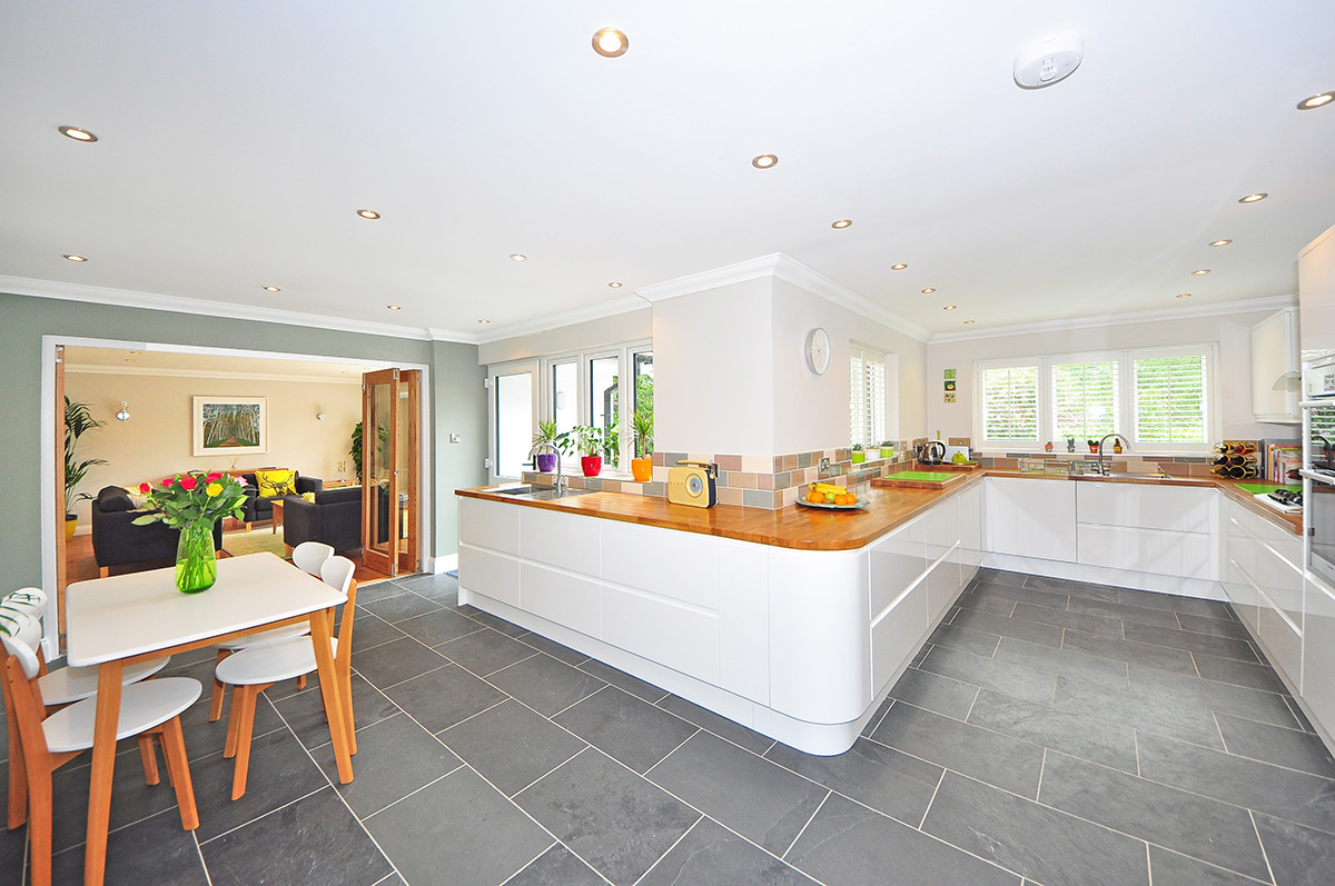 modern kitchen with grey tile flooring